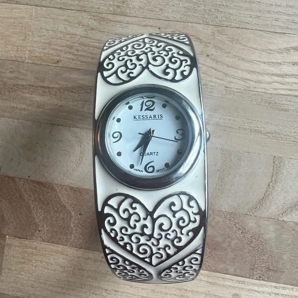 Kessaris ladies hinged bangle enamel hearts bracelet watch NEW BATTERY